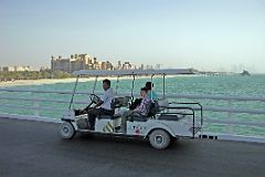 Dubai 07 Burj Al Arab 04 Taking Golf Buggy To Entrance